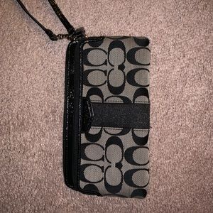 Like new, black and grey coach wristlet!